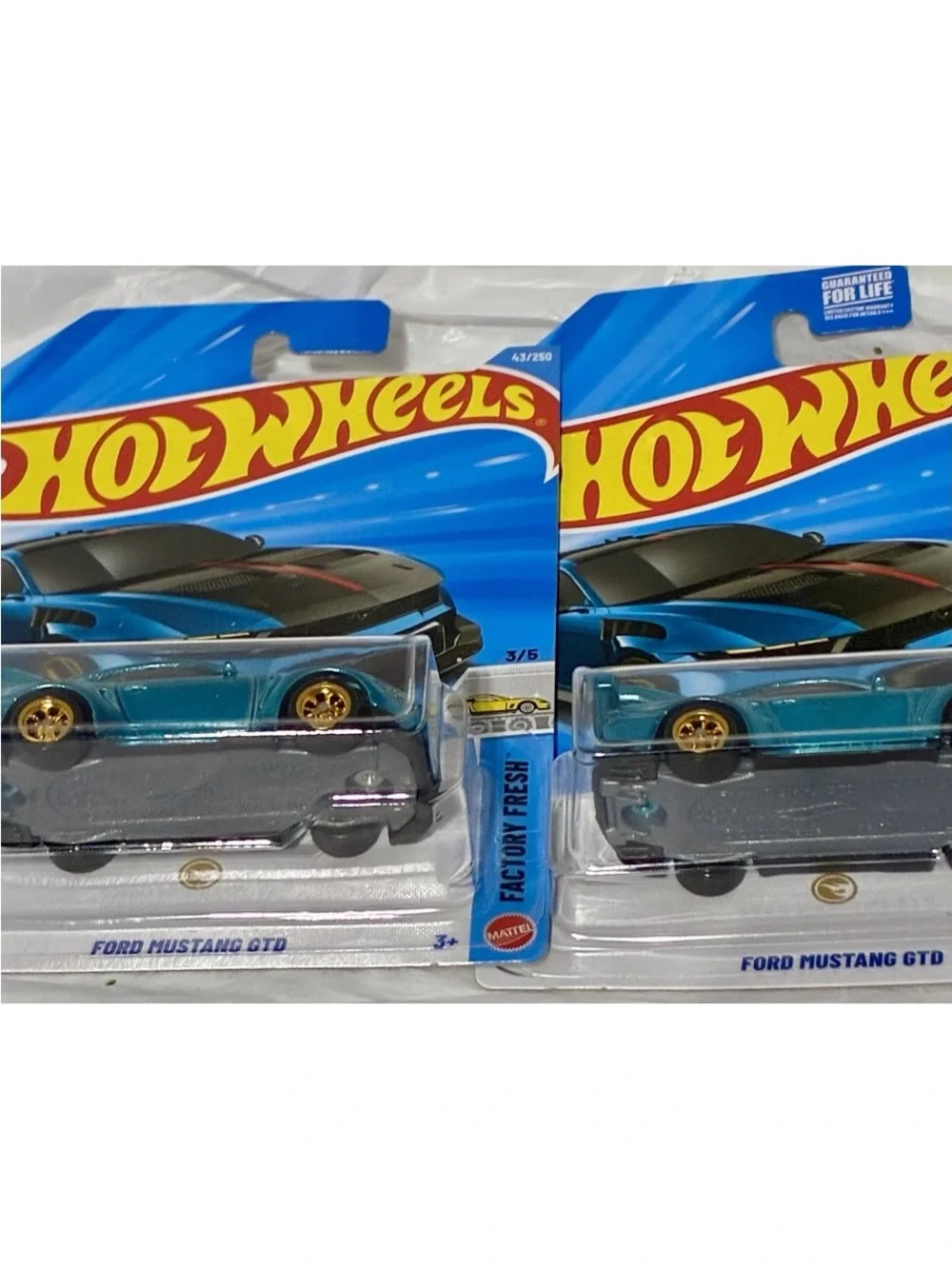 2 Super Treasure Hunt GTD Mustangs (1 peg holder slightly bent) and 2  regular